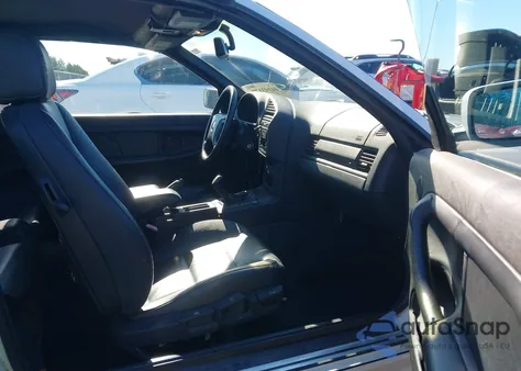 1999 BMW 323Ic z USA, uszkodzony, nr VIN WBABJ7334XEA17837